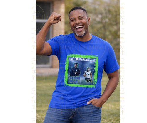 Man wearing a blue t-shirt with a graduation design, outdoors.