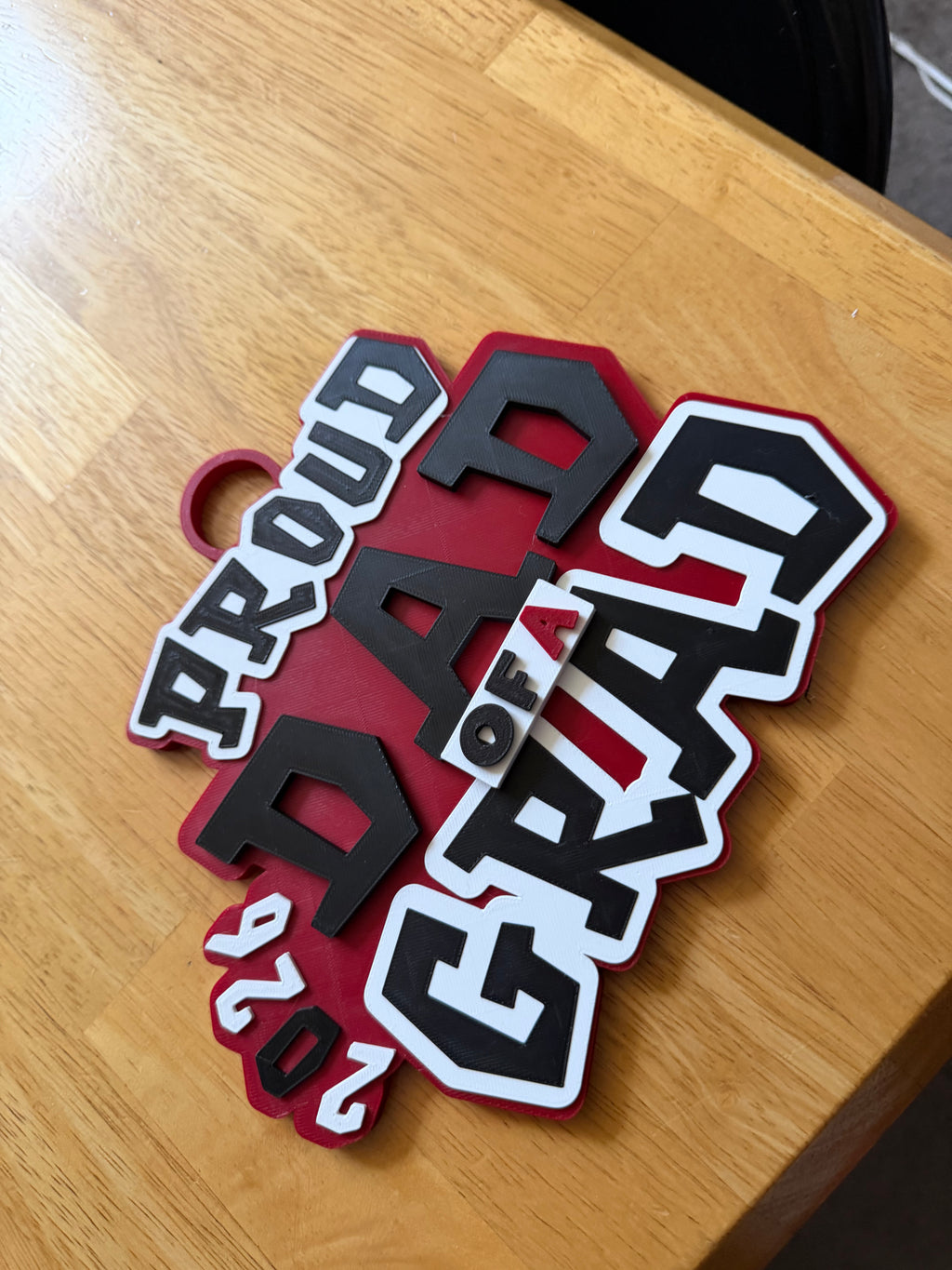 Flat lay of red black and white hype chain without chain links 