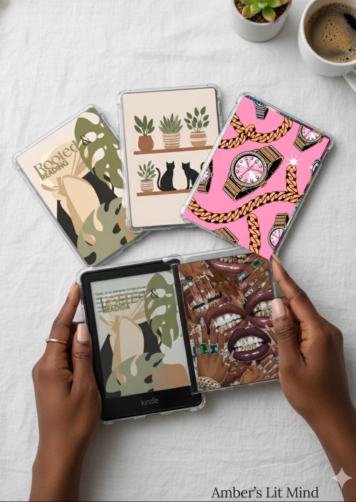 Hands holding a Kindle with various e-reader cases on a white surface.